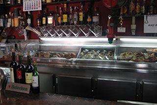 Barra restaurante Marisqueria Quique Comillas Cantabria