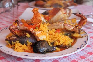 racion Paella restaurante Marisqueria Quique Comillas Cantabria