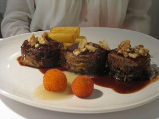 Restaurante Los Raqueros Santander Timbal de rabo de toro.